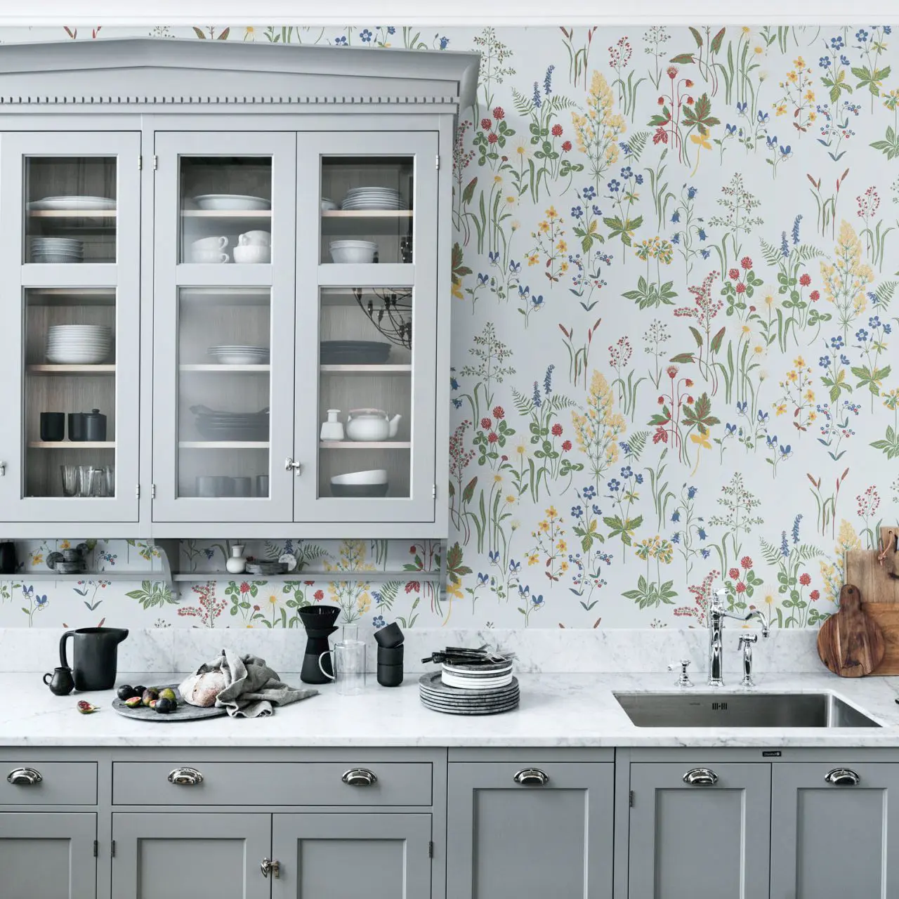 Custom foil wallpaper installation in bright California-style kitchen