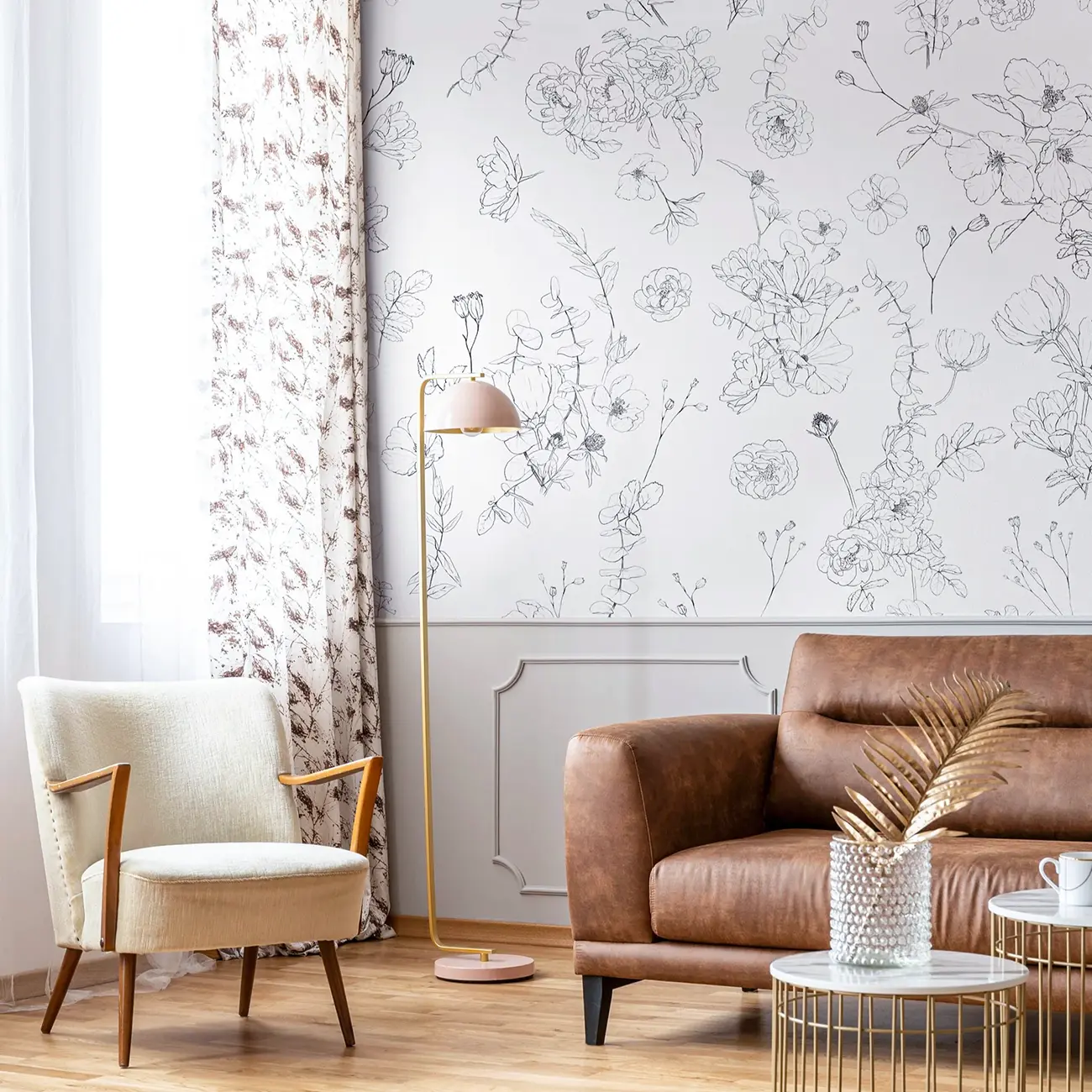 Elegant living room with designer wallpaper installed on main accent wall