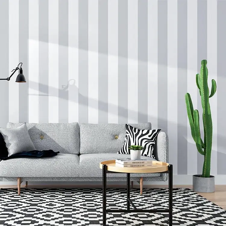 Living room accent wall with luxury textured wallpaper installed
