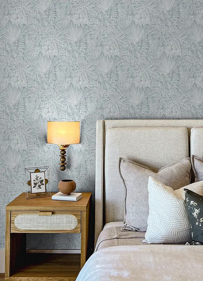 Luxury textured wallpaper installation behind master bed headboard