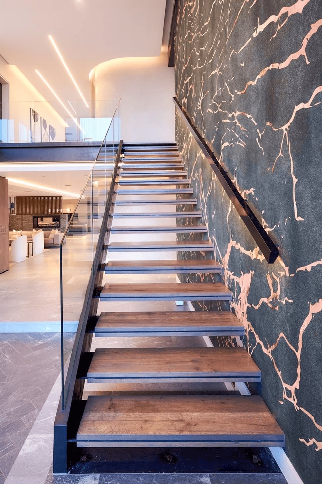 Wallpaper installation on staircase wall in San Diego
