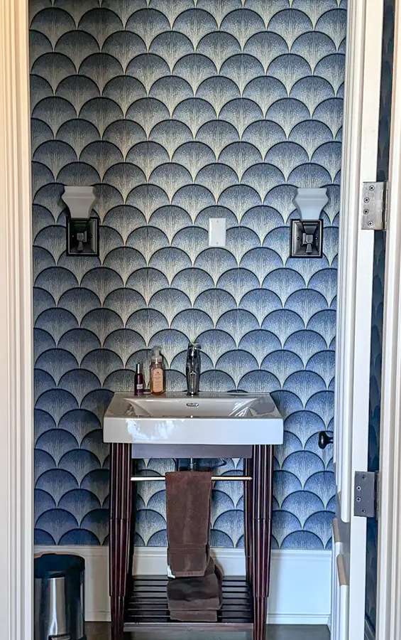 Wallpapering in bathroom