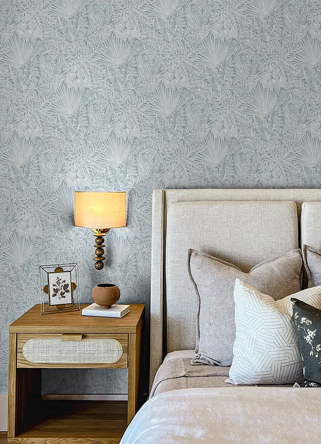 Luxury textured wallpaper installation behind master bed headboard